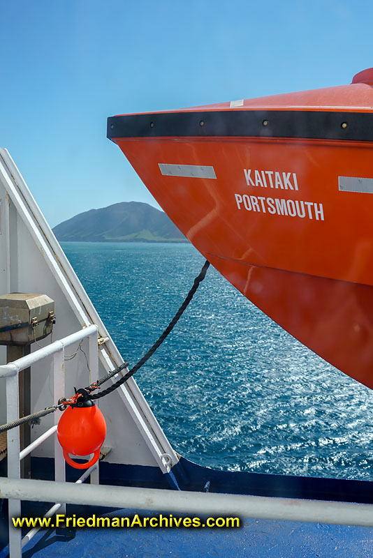 tourist,attraction,holiday,vacation,new zealand,ship,boat,lifeboat,orange,blue,